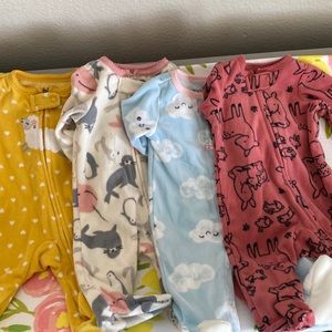 Lot of 4 newborn sleep n play footies